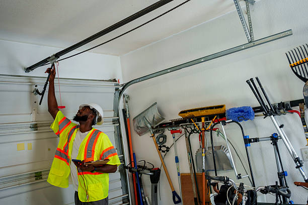 Professional Garage Door Panel Replacement technician working in New Rockford, ND